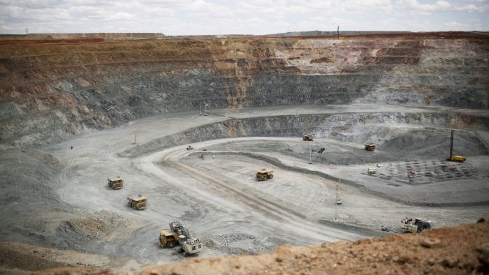 Inside Mongolia's Oyu Tolgoi Copper-Gold Mine...Bloomberg Photo Service 'Best of the Week': Heavy machinery operate inside an open pit at the Oyu Tolgoi copper-gold mine, jointly owned by Rio Tinto Group's Turquoise Hill Resources Ltd. unit and state-owned Erdenes Oyu Tolgoi LLC, in Khanbogd, the South Gobi desert, Mongolia, on Tuesday, June 17, 2014. Mongolia's Vice Minister for Mining Erdenebulgan Oyun said mining law amendments would increase MongoliaÕs area available to mining and exploration to 20 percent from around 8 percent, by lifting a 2010 ban on new licenses. The period of exploration would also increase from nine years to 12 years. Photographer: Brent Lewin/Bloomberg