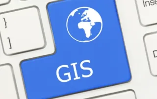 Enter key on a keyboard replaced with a blue GIS key